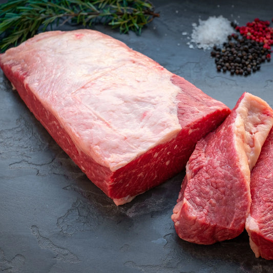 Primrose Herd beef brisket flat, raw cut showing marbling and flat shape, ideal for slow cooking or smoking.