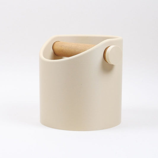 KNOCDIC® minimalist coffee knock box with desert tan finish and real oak wood bar for espresso machine use.