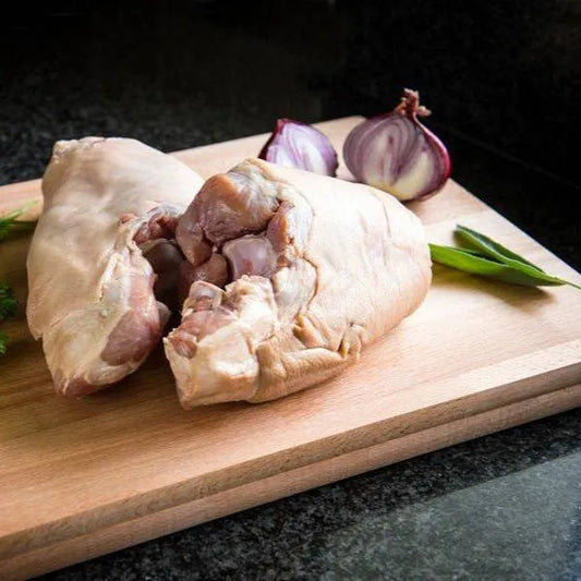 Smoked Cornish outdoor reared ham hocks from Primrose Herd, showcasing the meaty, seasoned exterior ready for cooking.