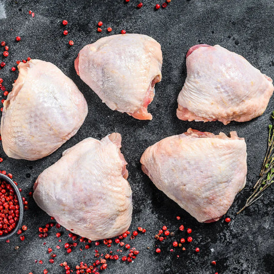 Boneless chicken thighs from Primrose Herd, free-range and fresh, displayed in a pack on a clean surface.