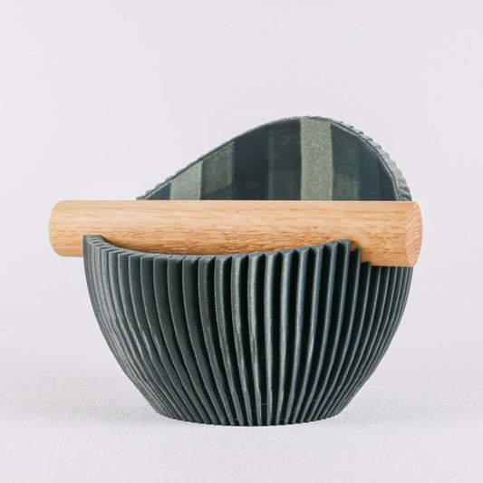 KNOCDIC Nova Coffee Knock Box with galaxy green finish and real oak wood bar for espresso machine cleanup.