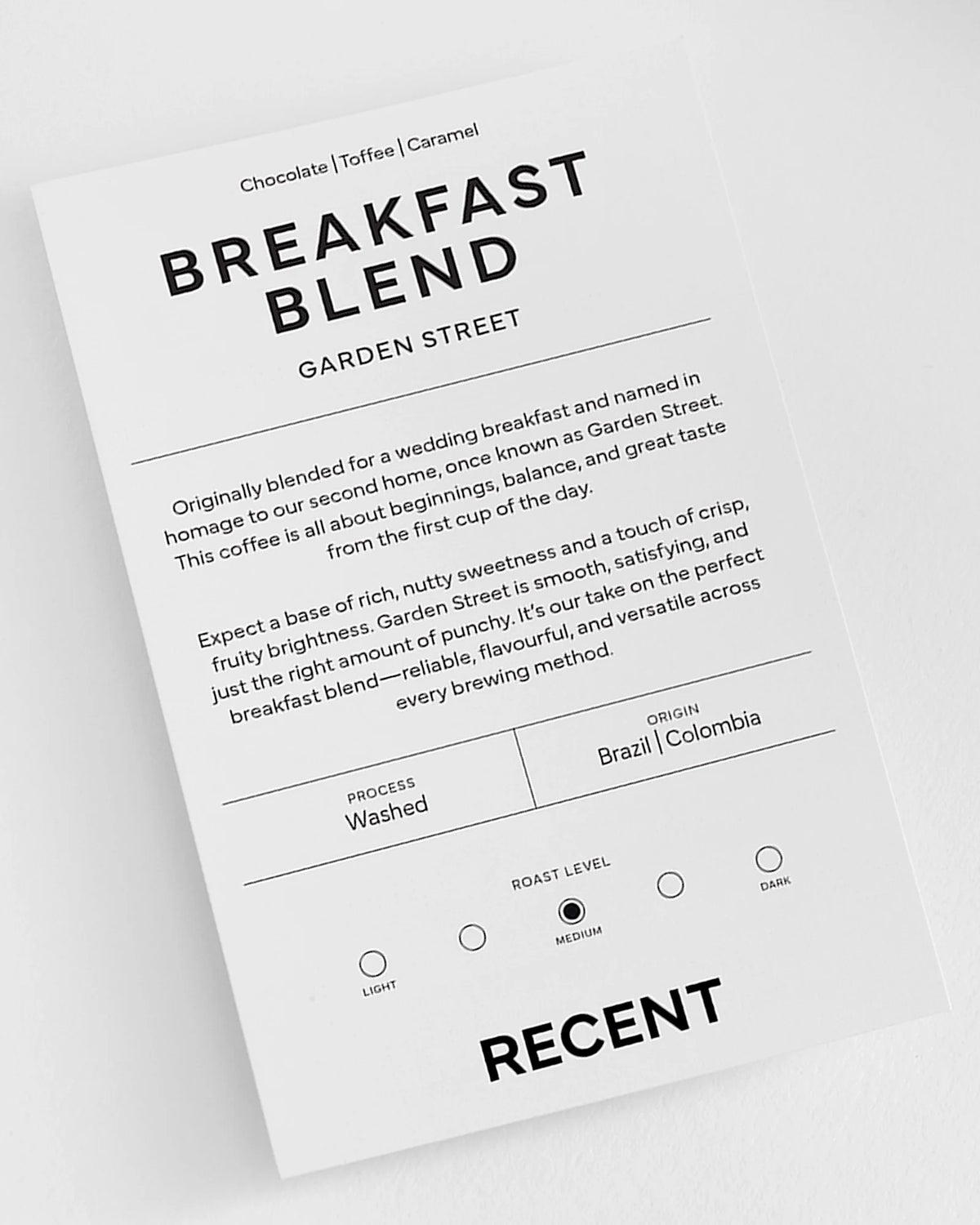 Medium roast coffee bag from Recent Beans, Garden Street Breakfast Blend, with a rich, aromatic coffee bean image.