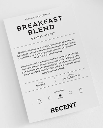 Medium roast coffee bag from Recent Beans, Garden Street Breakfast Blend, with a rich, aromatic coffee bean image.