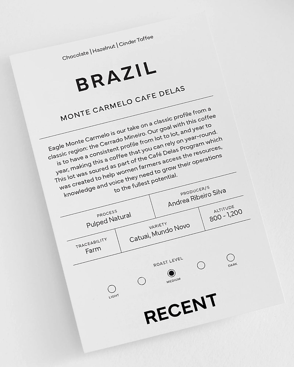 Medium roast Eagle Monte Carmelo Coffee from Recent Beans, showcasing roasted coffee beans in a natural setting.