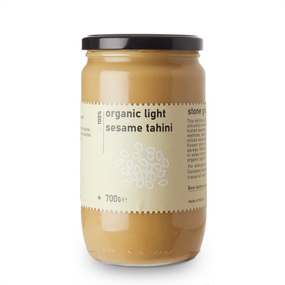 Organic Light Sesame Tahini spread from Whole Food Earth, showing a jar of creamy, light-colored sesame seed paste for dips and spreads.