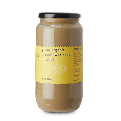 Creamy raw organic sunflower seed butter in a jar, spread on bread, from Whole Food Earth Raw Gorilla Dips & Spreads line.