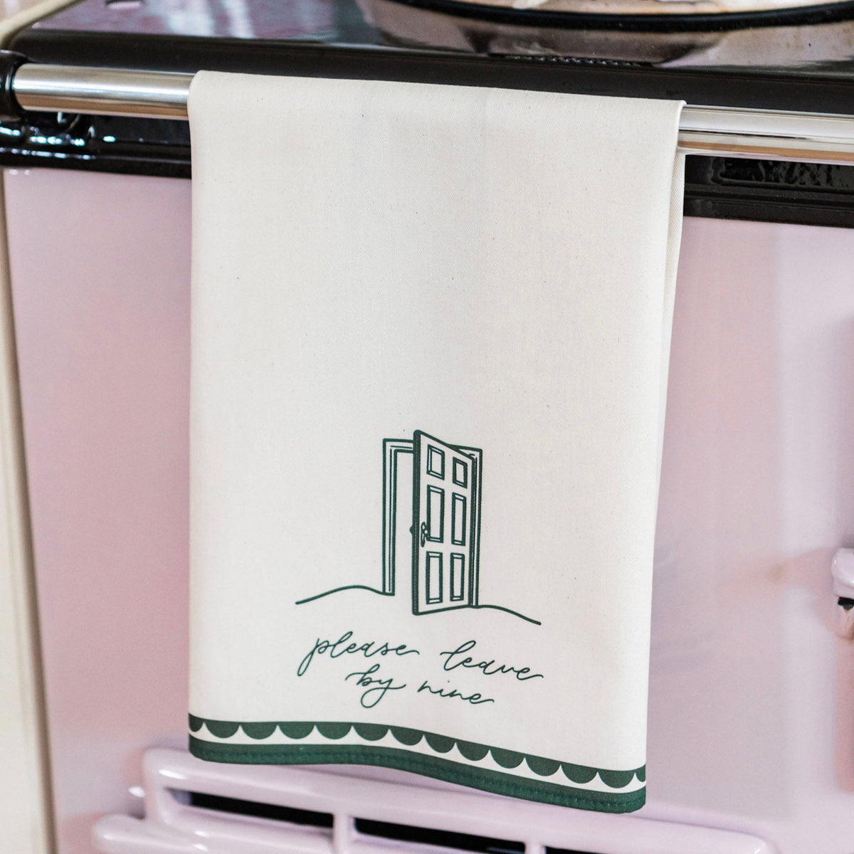 Avalon Home UK "Please Leave By Nine" tea towel with printed text and decorative design, made of soft fabric.