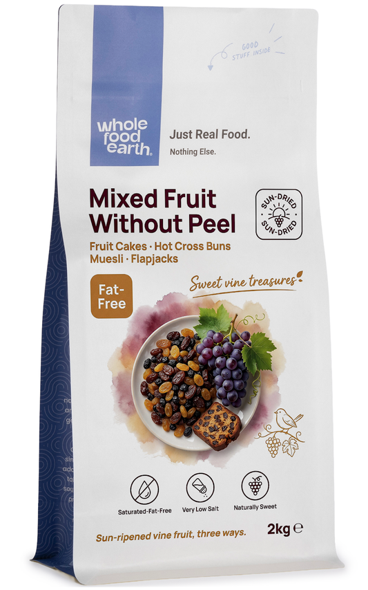 Assorted dried mixed fruit without peel from Whole Food Earth, showing colorful slices of dried apple, apricot, and pear.