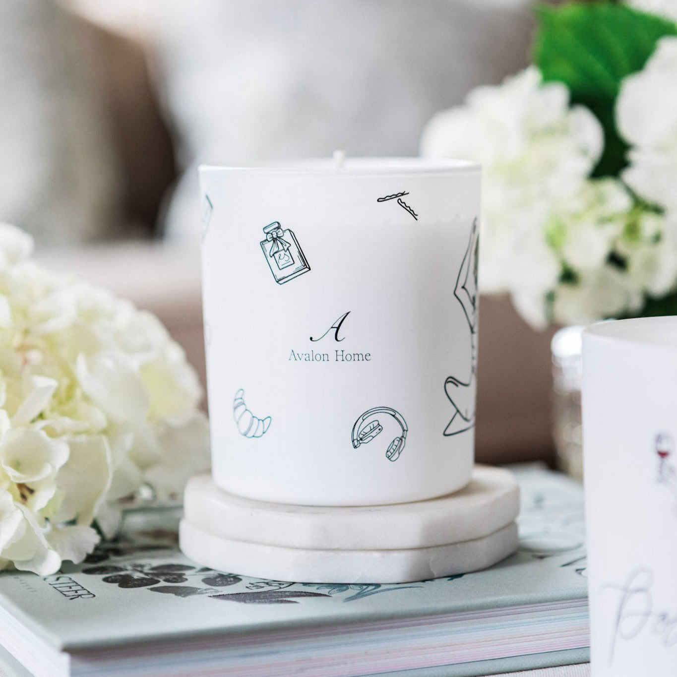 Natural wax glass candle from Avalon Home UK with a simple, elegant design and a glowing flame.