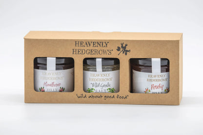 Heavenly Hedgerows Foraged Preserve Gift Pack with assorted jars of handcrafted fruit preserves in a decorative package.