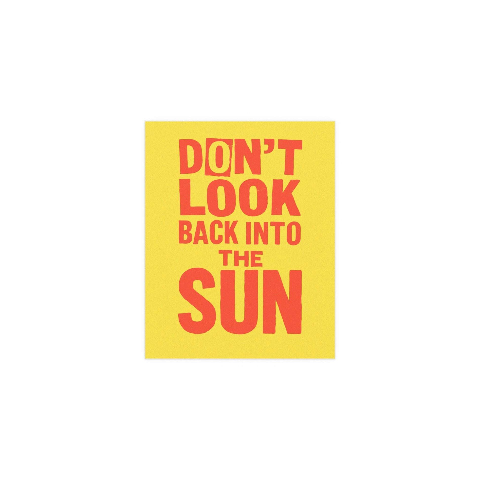 Poster of The Libertines' "Don't Look Back Into the Sun" in yellow and orange, featuring bold band artwork from Glow On Prints.