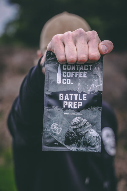ArtisanBox Battle Prep Coffee in a bag, featuring dark roasted beans with rich aroma and bold flavor for energizing mornings.