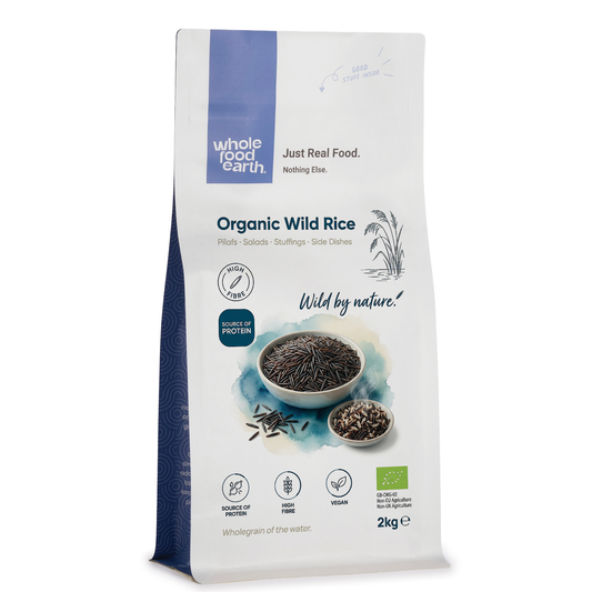 Organic wild rice from Whole Food Earth, showing a bowl of cooked wild rice grains with a natural, earthy appearance.