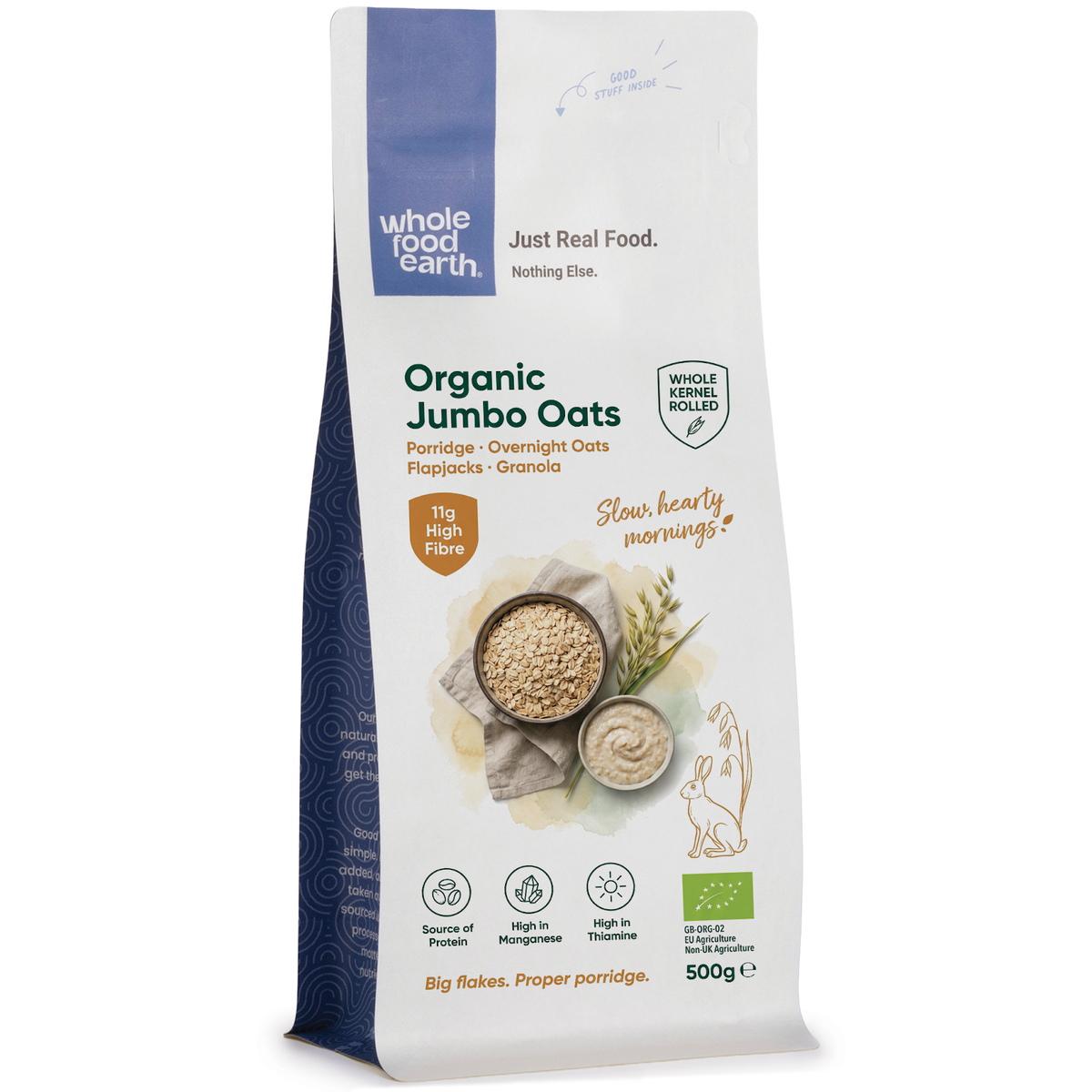 Organic jumbo oats in a clear bowl, showcasing whole cereal oats from Whole Food Earth on a neutral background.