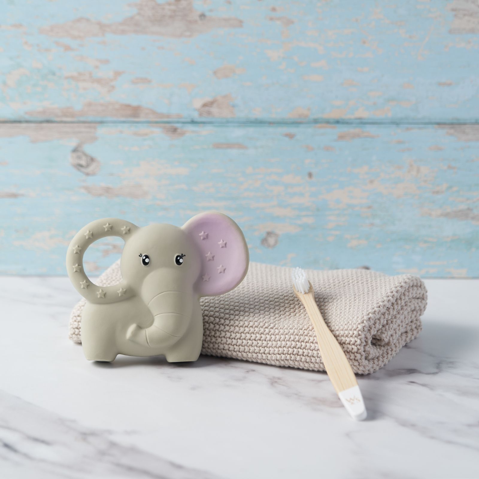 Natural Rubber Baby Teether by Wild And Stone, soft and safe teething toy made from eco-friendly rubber for soothing infants.