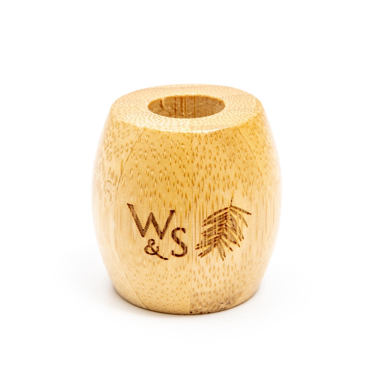 Wild and Stone bamboo toothbrush stand for adults, showcasing a sleek, eco-friendly holder with three slots for toothbrushes.