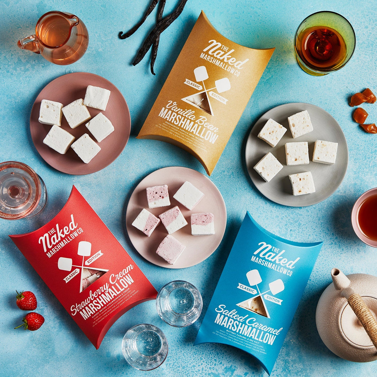 Three classic gourmet marshmallows from THE MARSHMALLOW FACTORY arranged on a neutral background.