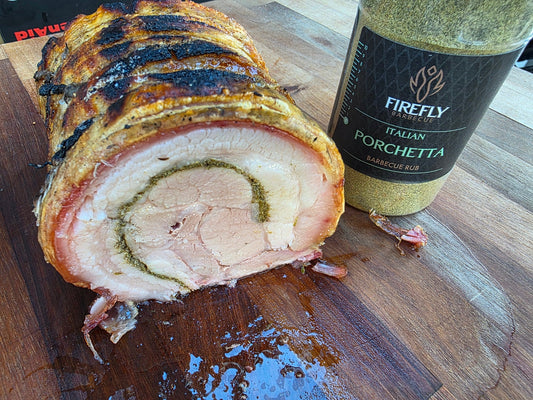 FireFly Barbecue Italian Porchetta Rub in a jar, seasoned BBQ rub with herbs and spices for flavorful pork dishes.