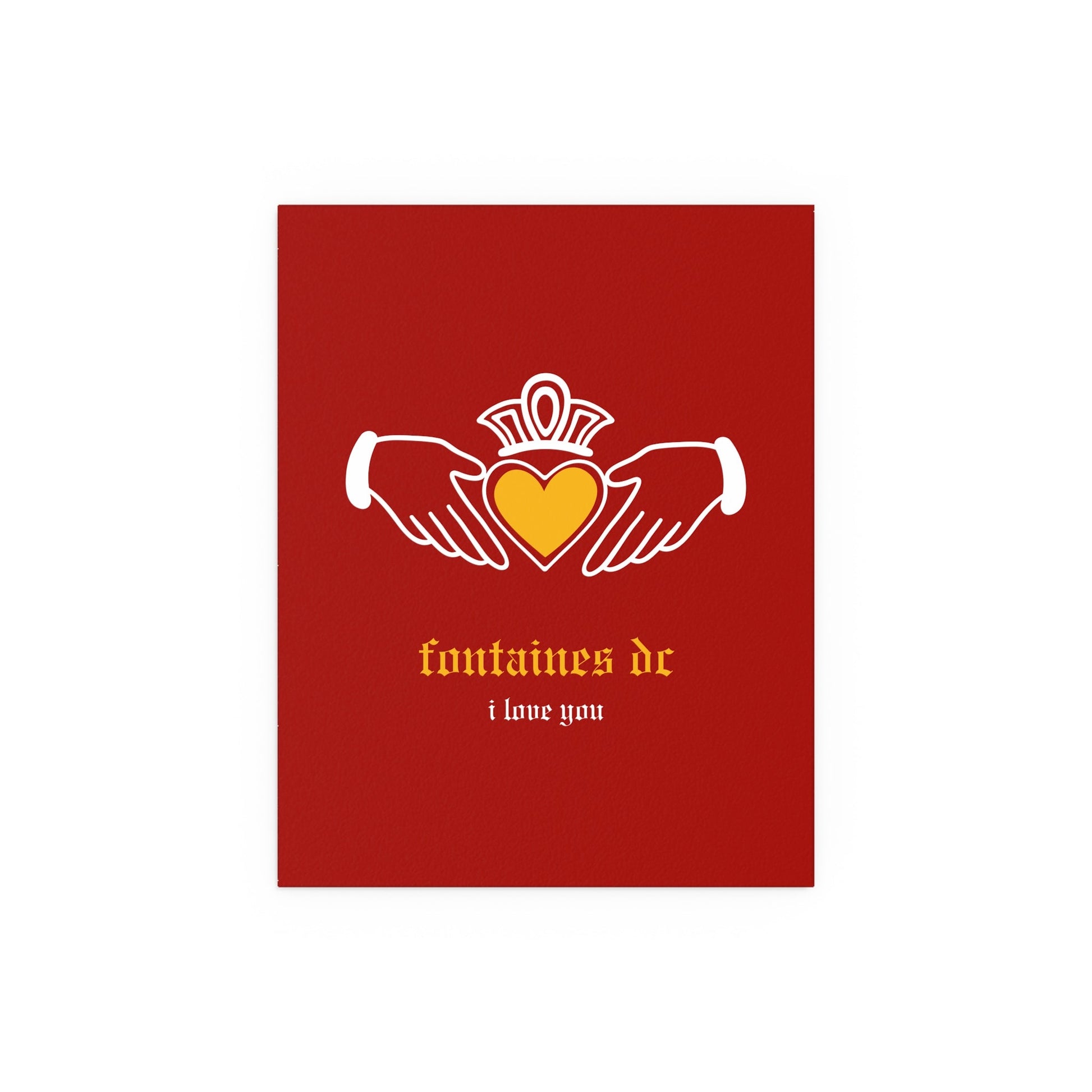 Irish Claddagh poster featuring Fontaines DC "I Love You" design in red and yellow colors, displayed on a wall.