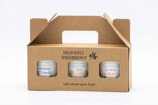 Heavenly Hedgerows Preserve Gift Pack with assorted jars of fruit preserves, ideal as a thoughtful gift set.