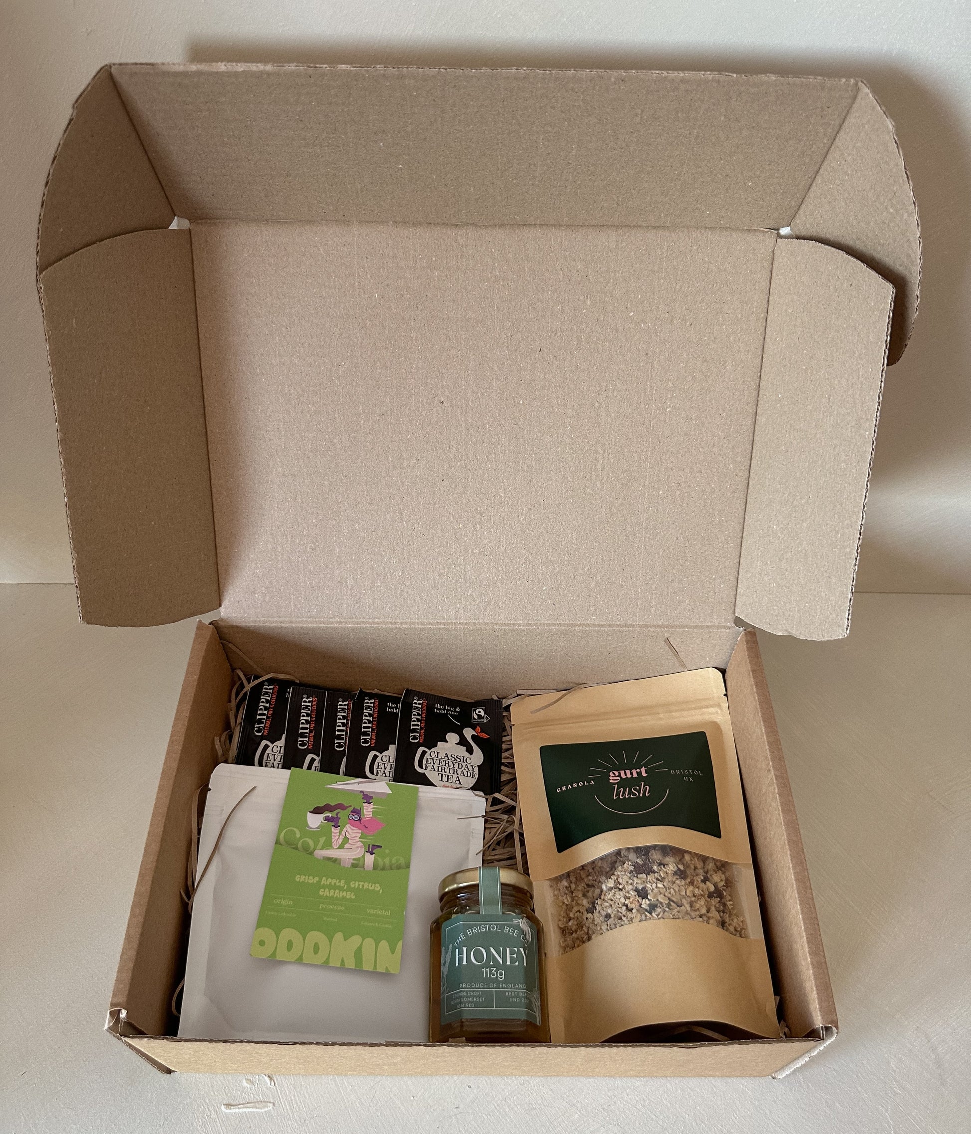 Bristol breakfast hamper from Gurt Lush Food Co featuring assorted breakfast treats and snacks in a stylish gift basket.