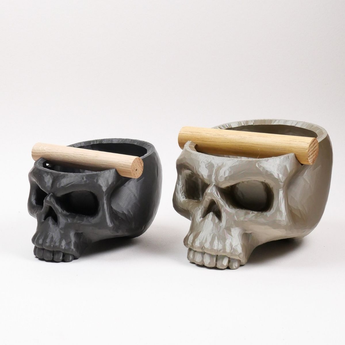 Gothic Skull Espresso Knock Box with Oak Bar by KNOCDIC® featuring a black skull design and a sturdy wooden bar for coffee grounds.