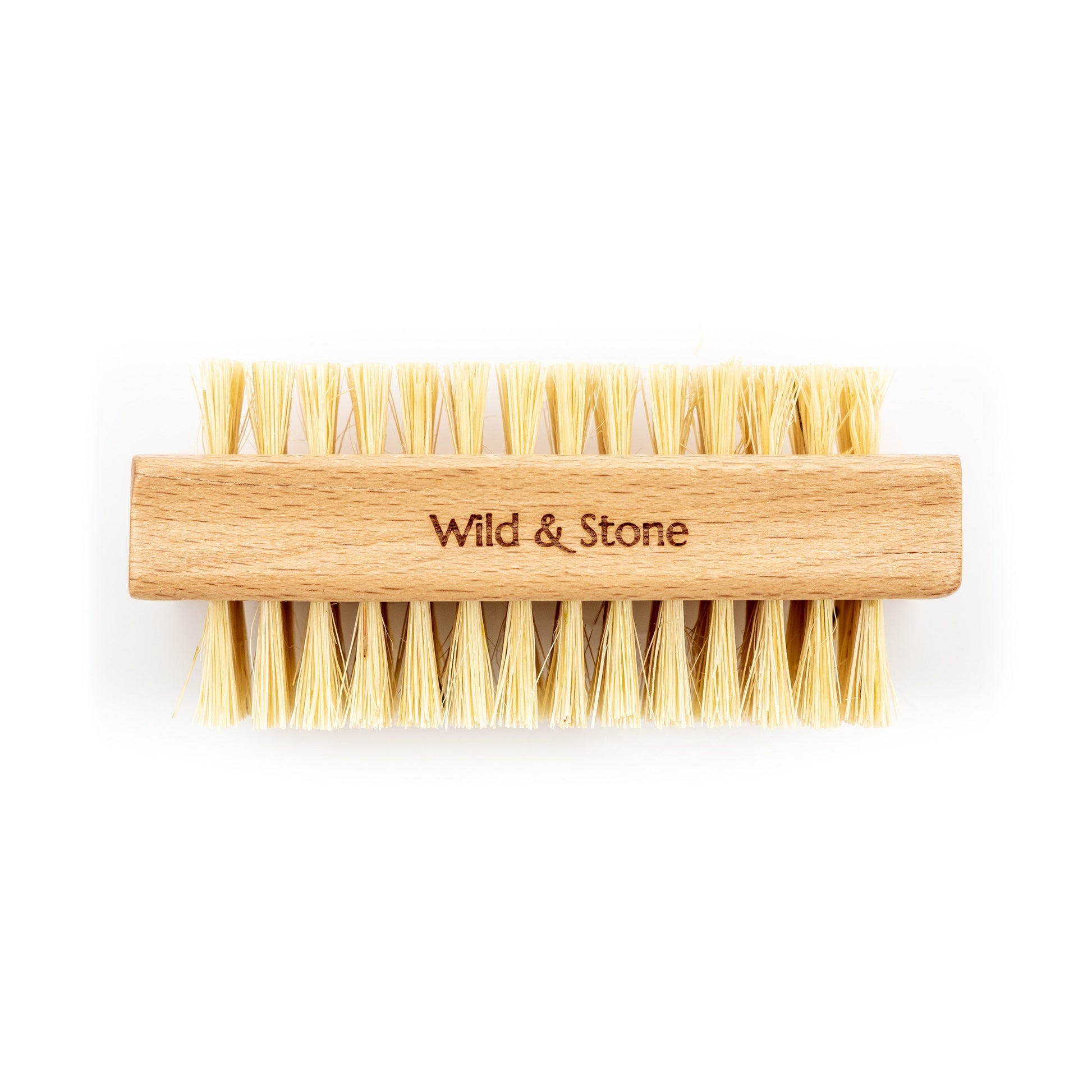 Natural biodegradable nail brush with wooden handle and soft bristles, ideal for cleaning nails and maintaining hygiene.