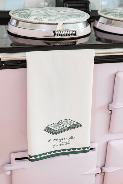 Avalon Home UK recipe for disaster tea towel featuring colorful, humorous kitchen design with text and vibrant patterns.