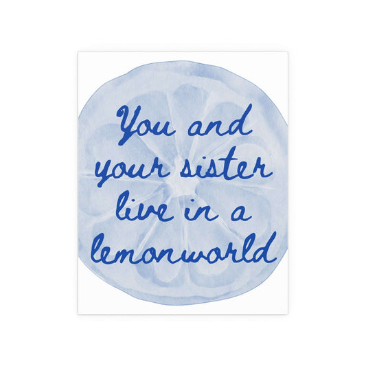 White and blue "Lemonworld" poster by The National, displayed on a wall, featuring vibrant lemon illustrations and artistic design.