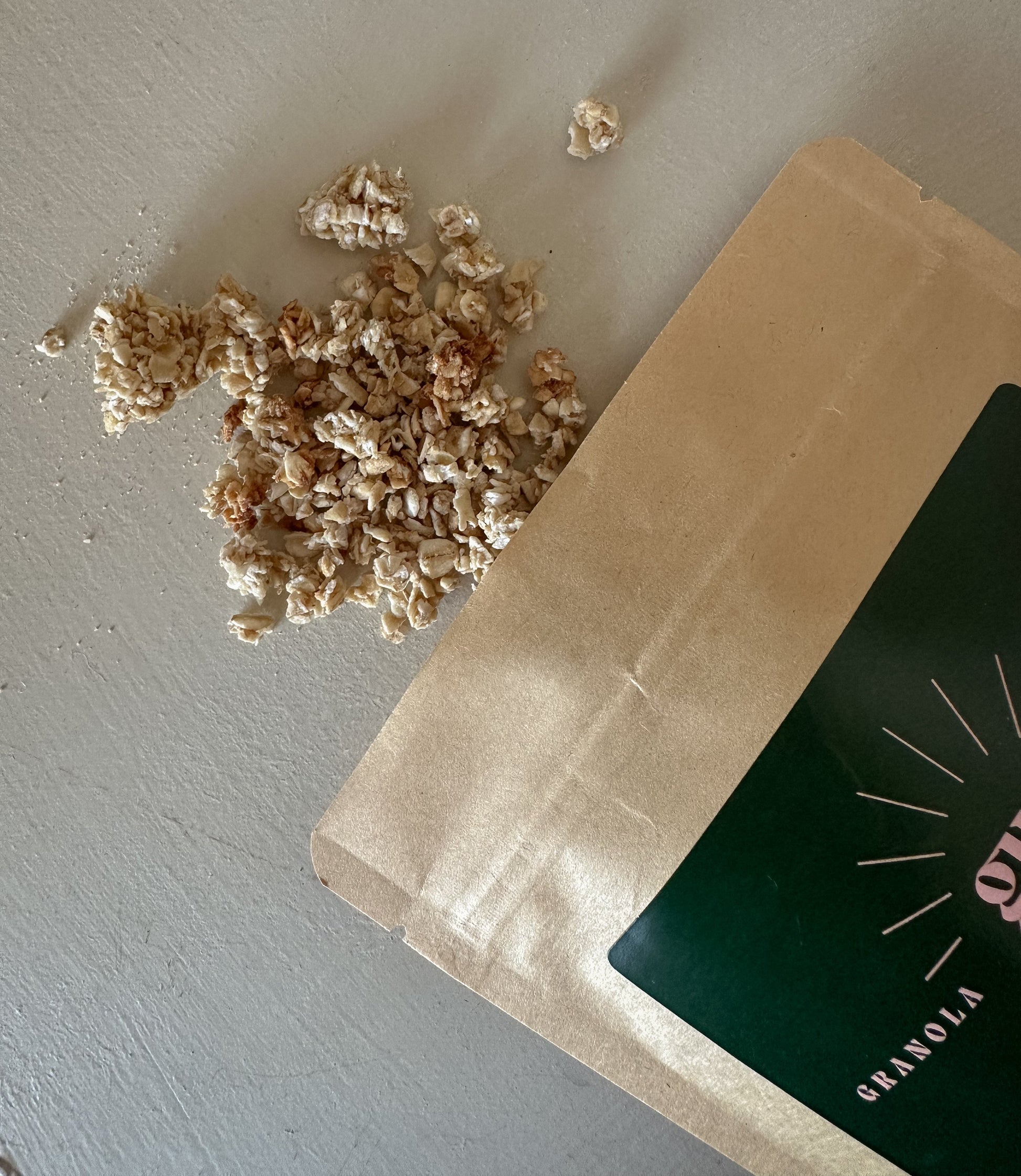 Honey and vanilla granola from Gurt Lush Food Co, displayed in a bowl with visible oats, honey drizzle, and vanilla beans.