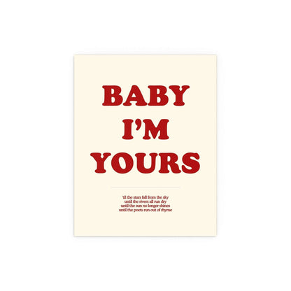 Off-white and red "Baby I'm Yours" poster by Glow On Prints, featuring stylish typography on a wall.