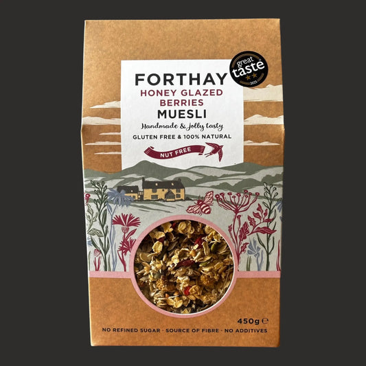 ArtisanBox Selection Forthay Luxury Muesli with honey-glazed berries in a bowl, showcasing a mix of oats, dried fruits, and berries.