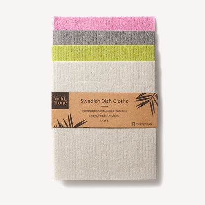Set of four Wild And Stone compostable Swedish dish cloths with colorful, eco-friendly fabric for kitchen cleaning.