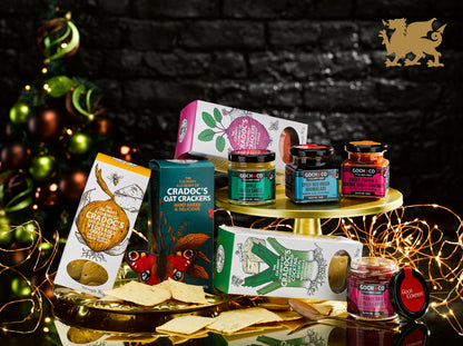 Goch & Co Celebration Hamper with assorted food items, displayed in a festive gold-themed gift basket for special occasions.