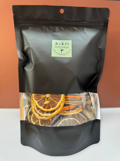 Dried lemon slices from JoJo’s Kitchen, thinly dehydrated lemon pieces with bright yellow color and textured surface.