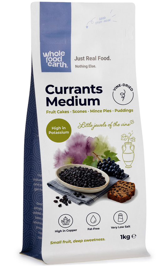 Dried medium currants from Whole Food Earth, showing a close-up of plump, dark dried currants in a natural setting