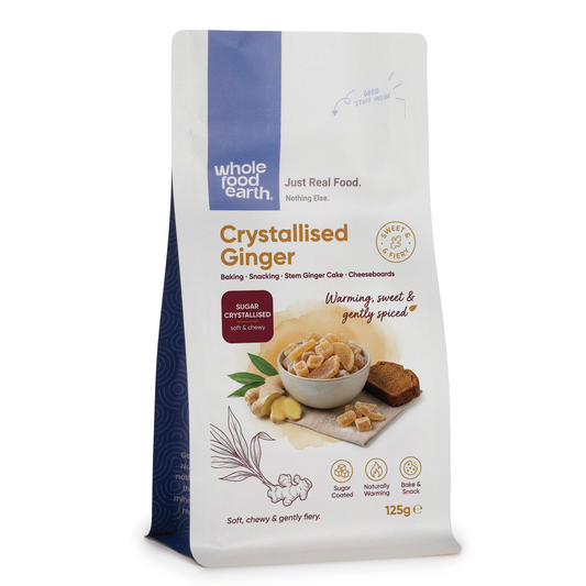 Whole Food Earth crystallized ginger slices, a specialty product, shown in a close-up image highlighting the textured, candied ginger pieces.