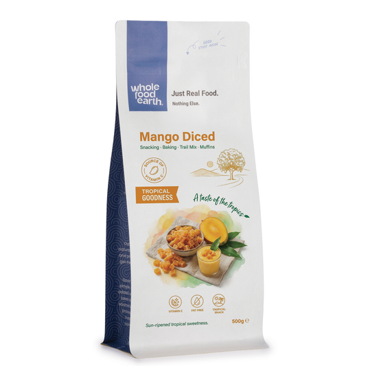 Dried mango diced pieces from Whole Food Earth, vibrant orange dried fruit for snacks or baking.