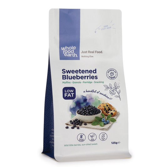 Dried sweetened blueberries from Whole Food Earth, premium dried fruits with vibrant blue color and chewy texture.