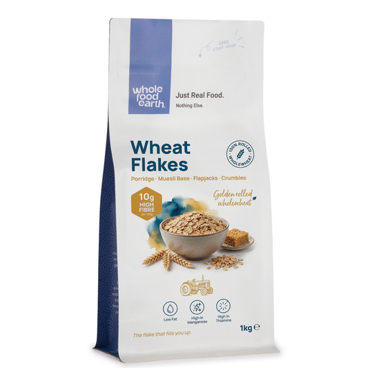 Whole Food Earth wheat flakes cereal in a bowl, showing crispy wheat flakes ready for breakfast.