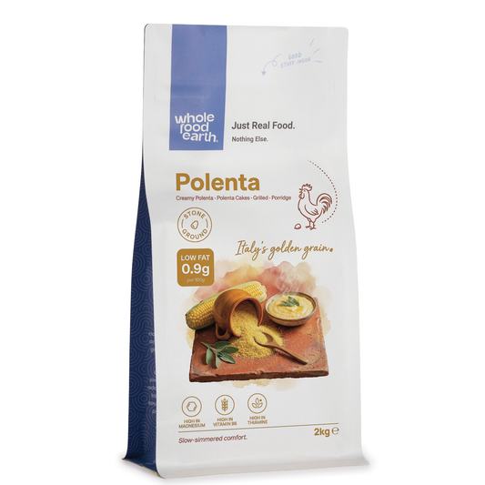 Whole Food Earth polenta flour in a bag, showcasing the golden yellow cornmeal used for cooking and baking.