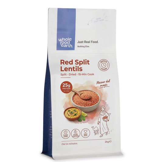 Red split lentils from Whole Food Earth, dry beans and pulses, showing vibrant orange-red color and smooth split texture.
