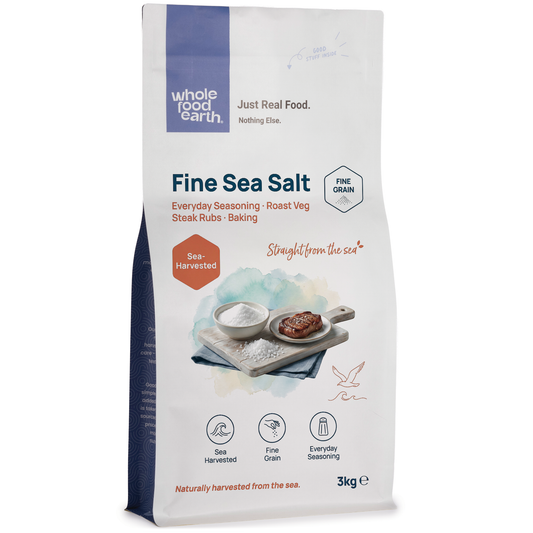 Fine sea salt mineral from Whole Food Earth, showing white crystalline grains in a close-up image.