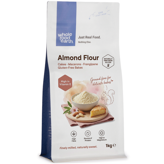 Whole Food Earth almond flour in a clear bag, showing finely ground, light beige almond powder for baking and cooking.