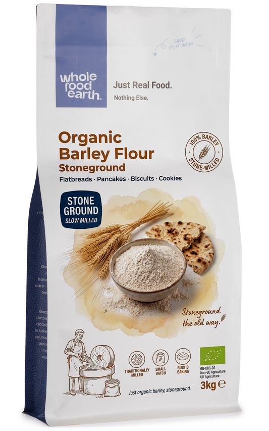 Organic stoneground barley flour from Whole Food Earth, showing a close-up of golden, finely ground barley flour in a bowl.