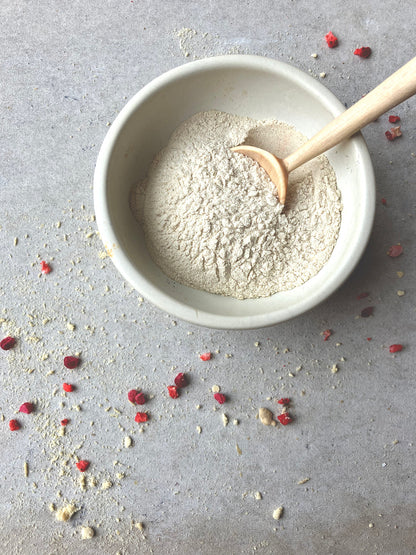 Freeze dried banana powder from Whole Food Earth, showing vibrant yellow dried banana slices on a white background.