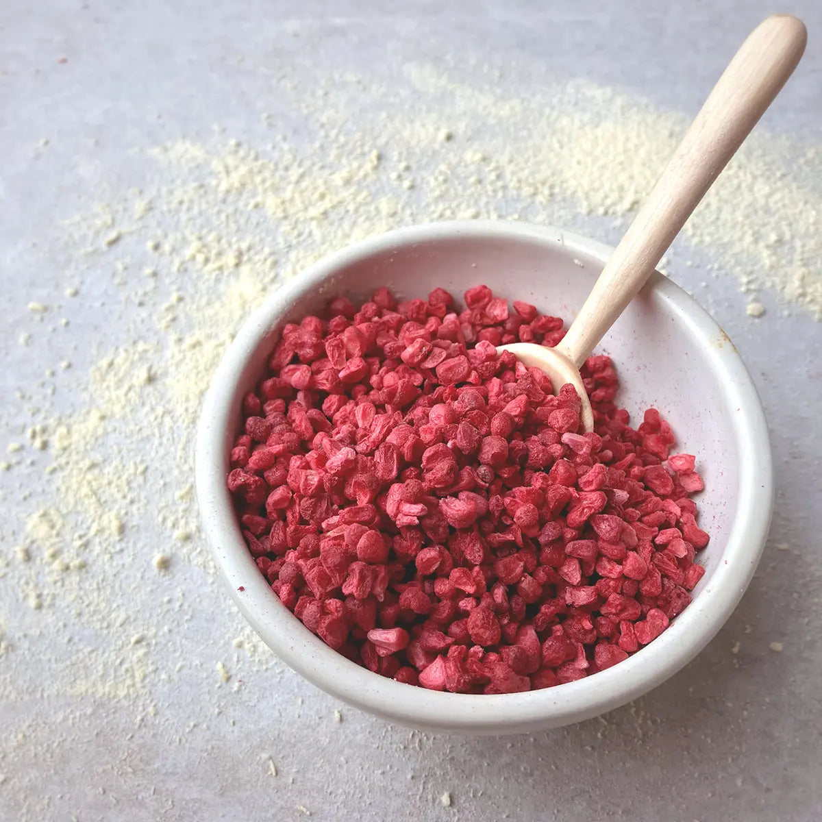Freeze dried raspberry crumbs from Whole Food Earth, dried fruit topping with vibrant red raspberry pieces and crumbs.