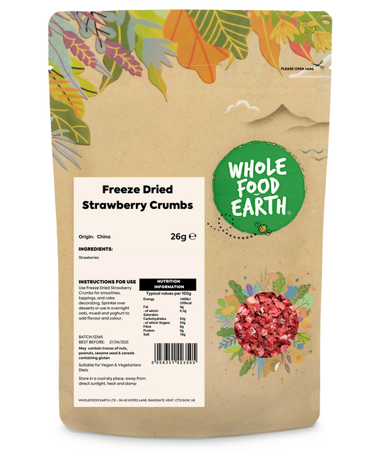 Freeze dried strawberry crumbs from Whole Food Earth, showing vibrant red dried fruit pieces in a resealable bag.
