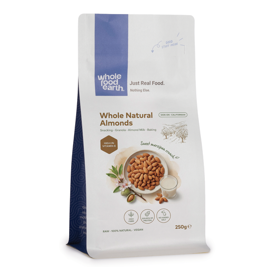 Whole Food Earth organic whole almonds in a bowl, showing their natural, crunchy appearance as healthy nuts and seeds.