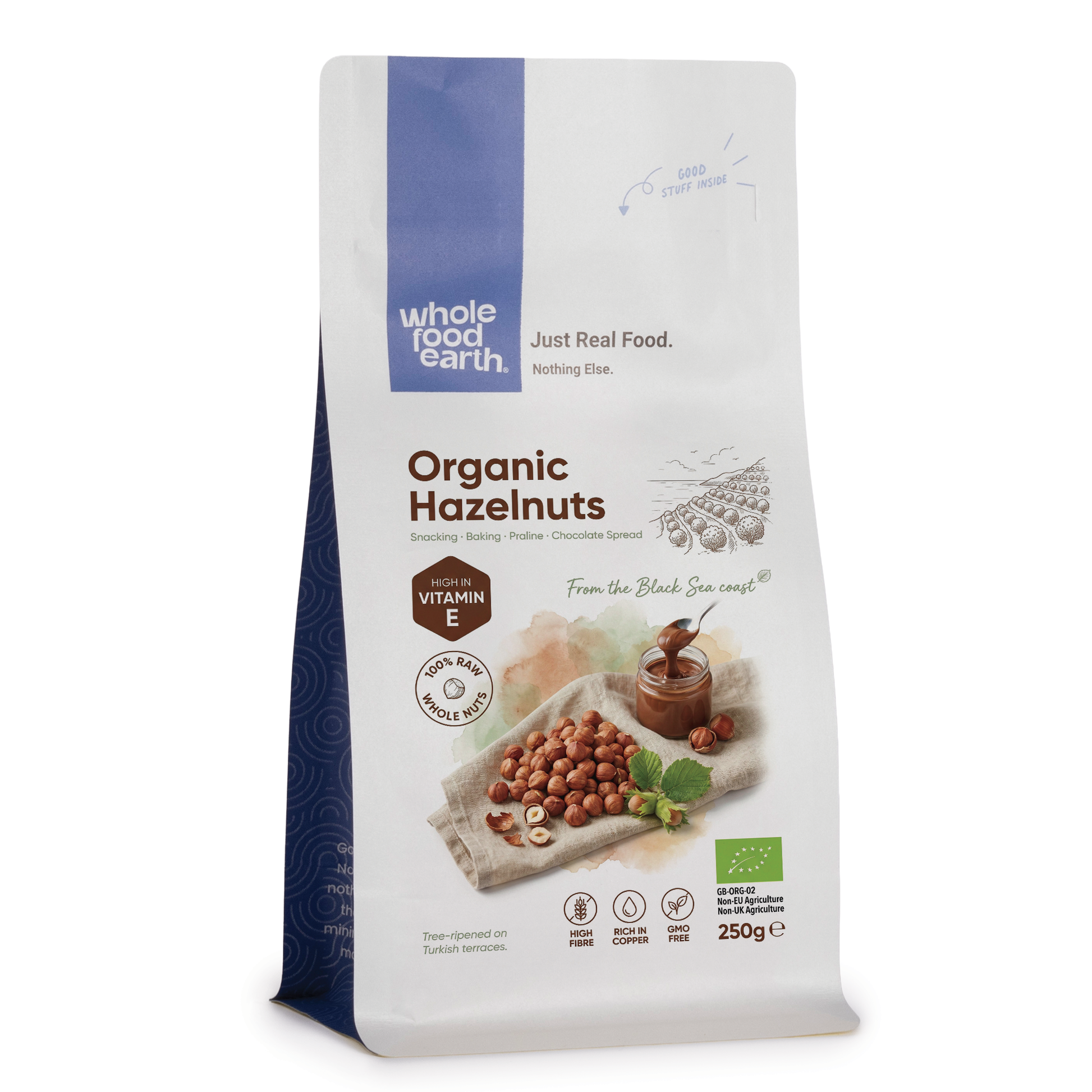 Whole Food Earth organic hazelnuts in a bowl, showcasing whole, raw nuts perfect for snacking or baking.
